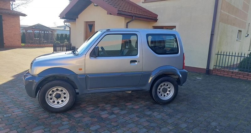 Suzuki Jimny cena 35700 przebieg: 155460, rok produkcji 2011 z Nidzica małe 211